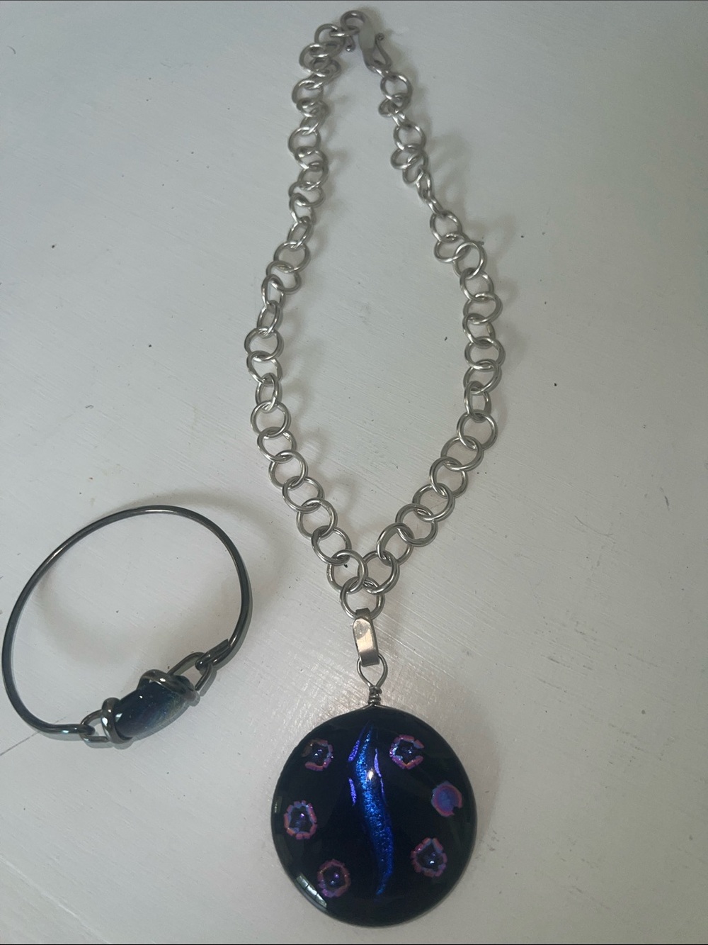 Handcrafted Black Glass Pendant Necklace and bracelet with Blue Accents